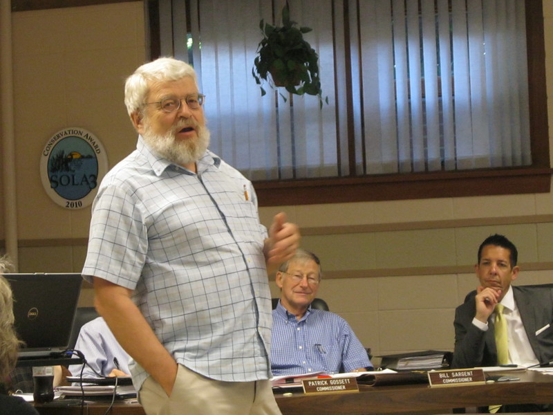 Jonathan Larsen, assessor for PTA/DelVal, speaks to the Rehoboth Beach commissioners on the methodology for the recent citywide property reassessment. The city commissioners have begun holding appeals hearings on the reassessment, and have delayed setting the property tax rate until July. BY RYAN MAVITY